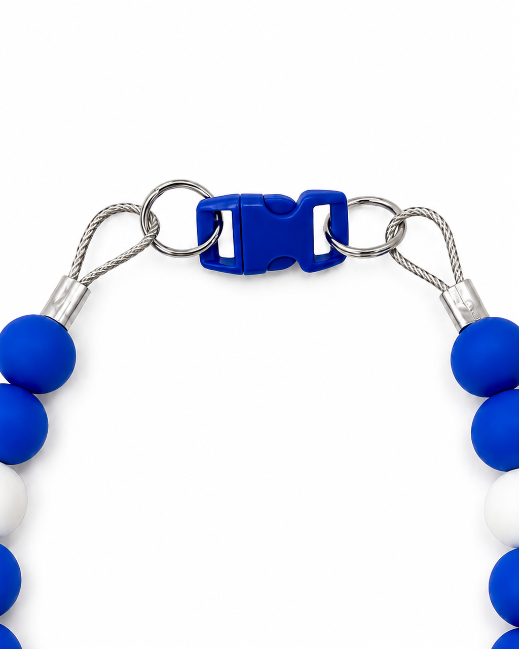 Close-up of the Blue Pawsch beaded dog necklace showing the blue clasp, silver rings, cable, crimps, and blue and white beads